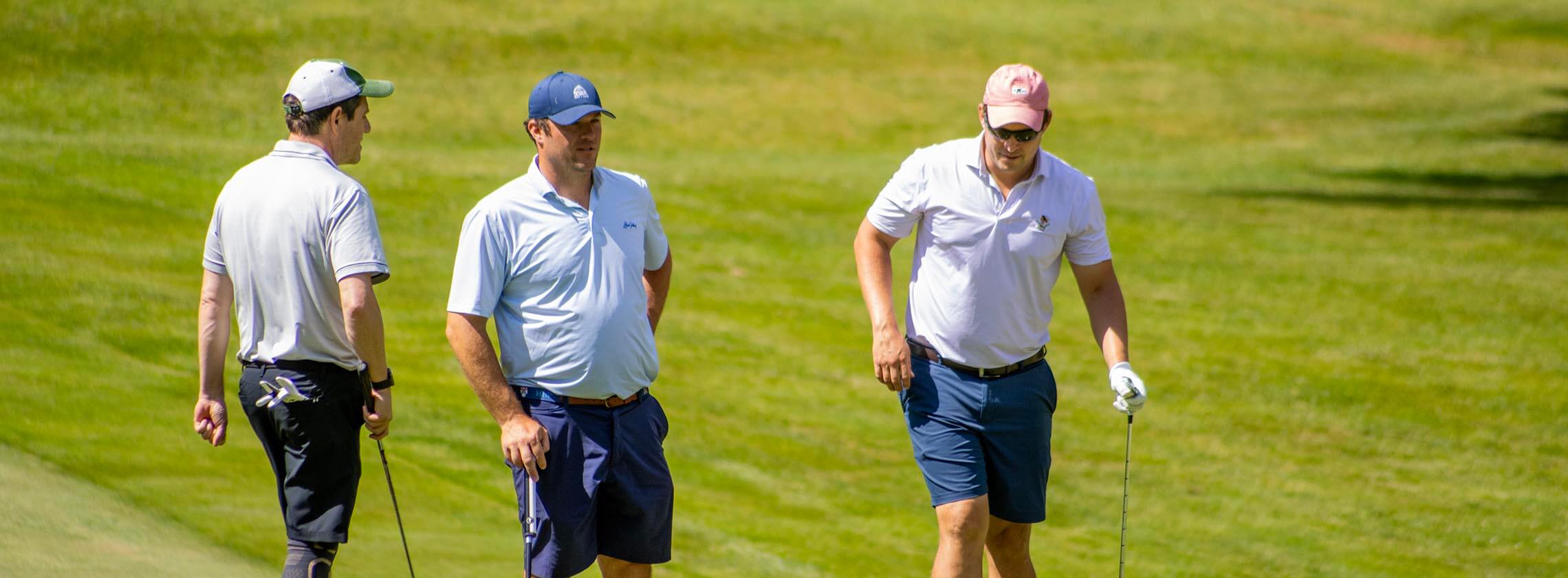 men on golf course