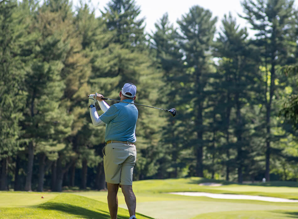 man golfing