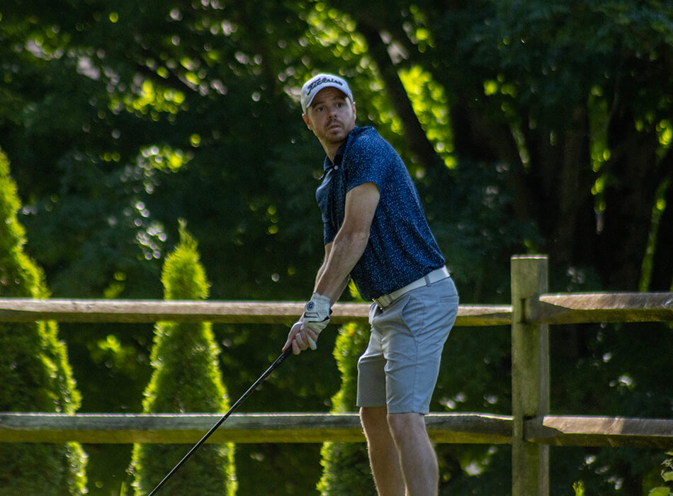 man golfing