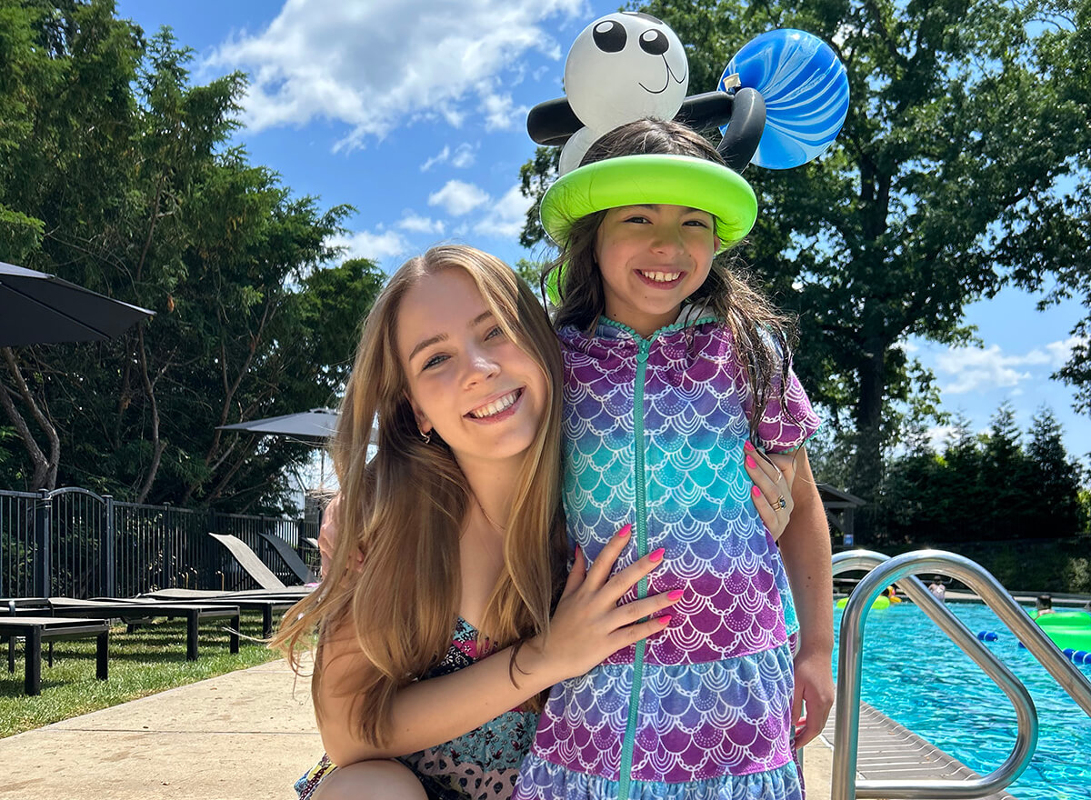 mom and daughter at the pool